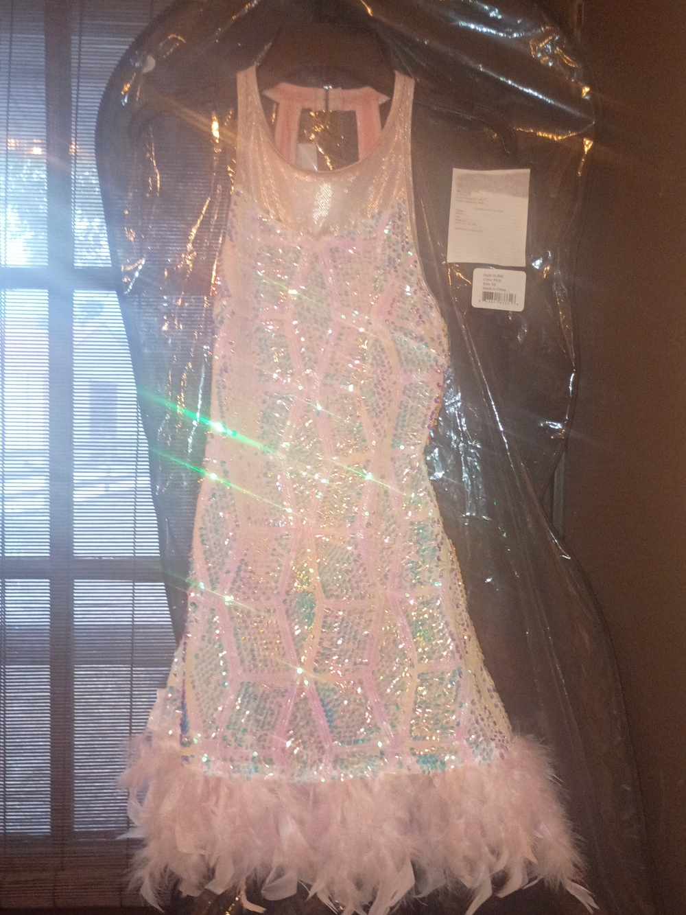 Revolution Pink Sequin Feather Hem Cocktail Dress